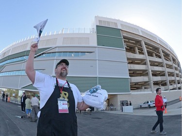 Gary Bresch sells team towels at the new Mosaic Stadium test event featuring the University of Regina Rams vs. the University of Saskatchewan Huskies in Regina, Sask. on Saturday Oct. 1, 2016.