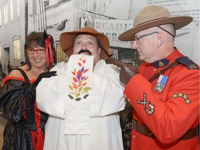 Jackie Senko as "Klondike Kate", Andrew Waithe as "The Good Padre" and Cpl. Dan Toppings in the role of a North-West Mounted Police officer pose at the RCMP Heritage Centre in Regina. The trio were promoting The trio were promoting A Night in the Museum – Murder in the Klondike, a murder mystery costume gala fundraising event on Oct. 22 to support The Caring Place and the RCMP Heritage Centre.