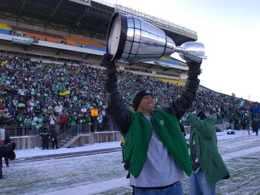 NEWS - REGINA, SK: NOVEMBER 26, 2007 - Injured Rider Matt Domingeuz walked the Grey Cup past the crowd as The Saskatchewan Roughriders made their first stop upon returning to Regina at Mosaic Stadium to a crowd of nearly 8,000 fans who braved -42 degree temperatures with the wind chill to greet their beloved Grey Cup Champions  Bryan Schlosser/Regina Leader-Post.