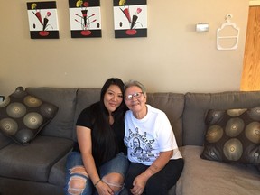 Candy Fox (right) sitting with her grandmother Gloria, who participated in the Newo Yotina Friendship Centre's Healing Tour.
