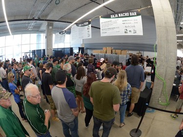 People queue for food at the new Mosaic Stadium test event featuring the University of Regina Rams vs. the University of Saskatchewan Huskies in Regina, Sask. on Saturday Oct. 1, 2016.