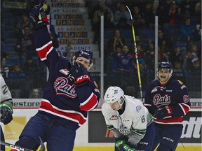 Regina Pats forwards Austin Wagner, left, and Filip Ahl, right, celebrate Wagner's goal against the Seattle Thunderbirds on Sunday.