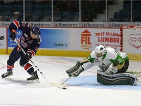 Regina Pats centre Jake Leschyshyn, left, is enjoying a breakout season as a WHL sophomore.