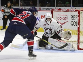 Regina Pats rookie forward Nick Henry, shown in action against the Red Deer Rebels, recorded his first WHL hat trick on Friday night in a 5-4 OT win versus the host Kootenay Ice.