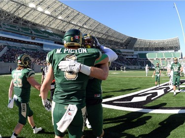 University of Regina Rams' Mitchell Picton (6) celebrates a touchdown catch  against the University of Saskatchewan Huskies at the new Mosaic Stadium in Regina.  This is the first event ever held at the new stadium.