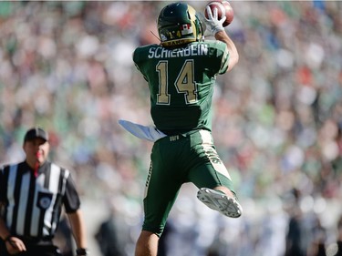 University of Regina Rams' Ryan Schienbein catches the very first ever touchdown during a game against the University of Saskatchewan Huskies at the new Mosaic Stadium in Regina.  This is the first event ever held at the new stadium.