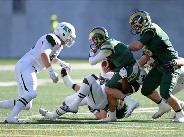University of Regina Rams' QB Noah Picton gets sacked during a game against the University of Saskatchewan Huskies at the new Mosaic Stadium in Regina.  This is the first event ever held at the new stadium.