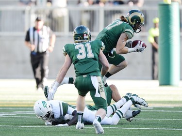 University of Regina Rams' Danny Nesbitt grabs an interception to end the drive of the University of Saskatchewan Huskies at the new Mosaic Stadium in Regina.  This is the first event ever held at the new stadium.
