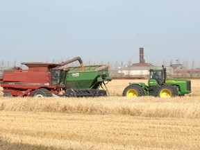 Agriculture and Regina's Evraz steelworks (background) are two sectors bluntly worried about the possible effect of carbon pricing or a carbon tax proposed by Ottawa.