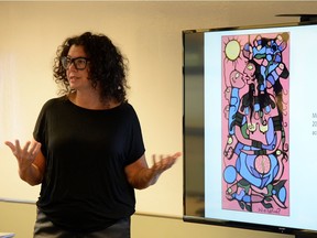 University of Regina professor Carmen Robertson does a presentation based on the work of Norval Morriseau as part of the U of R's Indigenous Research Day.