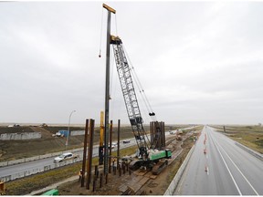 Crews work on an overpass on Pinkie Road and Trans-Canada Highway west of Regina. Construction jobs fell by 4,000 to 53,400 in September from 57,400 in September 2015.