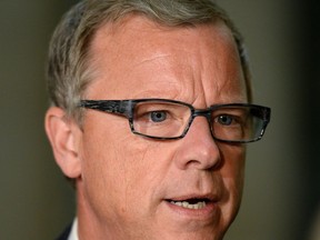 Premier Brad Wall speaks about the federal carbon pricing plan at the Legislative Building in Regina. L-P business columnist Bruce Johnstone wonders what Mr. Wall's climate change plan is.