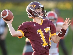 LeBoldus Golden Suns quarterback Josh Donnelly, shown in this file photo, threw five touchdown passes and added an 84-yard run on Thursday against the O'Neill Titans.