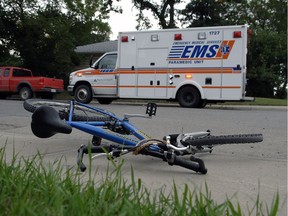 Aftermath of a collision between a vehicle and a bike in Regina in 2012. One person was taken to hospital.