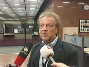 Jim Nicol, chief returning officer for the City of Regina, addresses reporters at City Hall regarding the new transit service in Ward 6.
