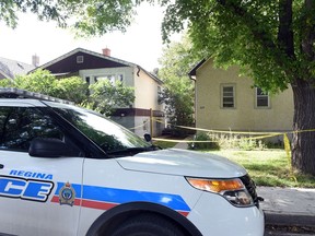 A police patrol car in September at the scene of Regina's sixth homicide of 2016.