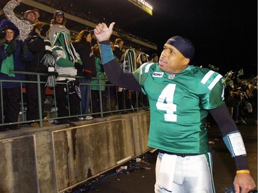 Saskatchewan quarterback Kerry Joseph celebrates with the fans after the west semi final match up between the Saskatchewan Roughriders and the Calgary Stampeders at Mosaic Stadium in Regina Sunday, The Riders won 26-24.