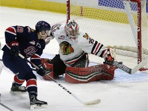 Jake Leschyshyn of the Regina Pats is stopped by Portland Winterhawks goaltender Michael Bullion  during WHL action at the Brandt Centre on Wednesday. Portland won the game 5-4 in overtime.