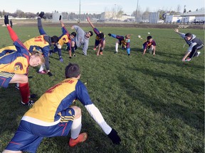 Members of the Sheldon-Williams Spartans boys soccer team prepare for a recent match.