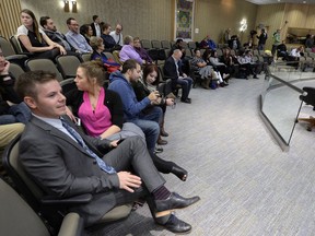 Councillor-elect Joel Murray (left) was among those waiting for results after the polls  closed on the civic election in Regina Wednesday night.