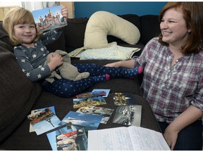 Colleen Book with her three and a half year-old daughter Charlotte (who goes by Charlie) and Charlie's stuffed rabbit Roger Rabbit.