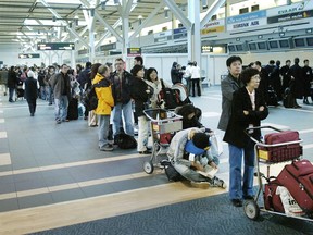 Passengers are enduring long screening waits at some Canadian airports.