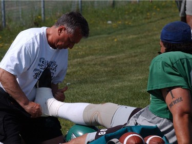 Trainer Ivan Gutfriend works on a player for future  use in the rider supplement.