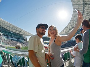 Taylor Guy and Orishia Benevelli take a selfie at the new Mosaic Stadium test event featuring the University of Regina Rams vs. the University of Saskatchewan Huskies in Regina, Sask. on Saturday Oct. 1, 2016.