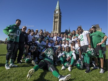 Prime Minister Justin Trudeau (centre) stole the show during the Riders walk-through on the lawn at Parliament Hill on Tuesday.
