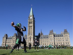 Roughriders quarterback Darian Durant winds up for a pass during the team's walk-through at Parliament Hill.