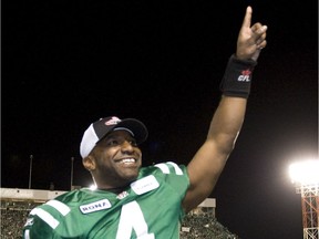 Saskatchewan Roughriders quarterback Darian Durant salutes the fans at Mosaic Stadium after a victory over the Calgary Stampeders in the CFL's West Division final on Nov. 22, 2009.