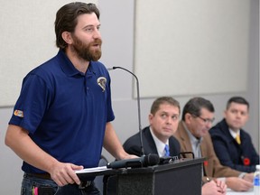 Courtland Klein, an executive member of the United Steel Workers Local 5890 in Regina, speaks during a pro-pipeline rally in White City. Listening are Conservative MP Andrew Scheer; Ray Orb, president of the Sask. Association of Rural Municipalities and Saskatchewan's minister of the economy, Jeremy Harrison.