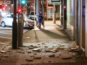 Glass and rubble covers the footpath on Wakefield Street after an earthquake on November 14, 2016 in Wellington, New Zealand. The 7.5 magnitude earthquake struck 20km south-east of Hanmer Springs at 12.02am and triggered tsunami warnings for many coastal areas.