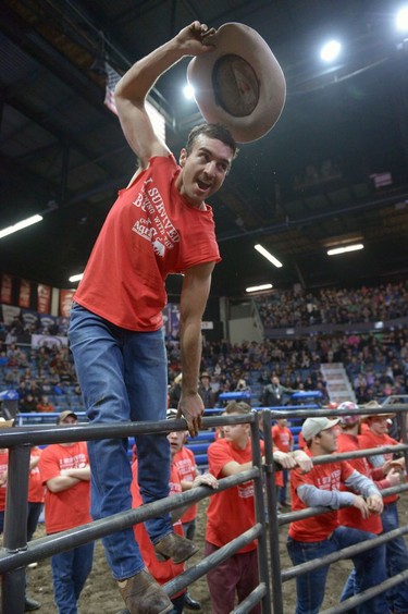 Adrien Powis-Clement celebrates winning $1500 at Running with the Bulls at Abribition at the Brandt Centre in Regina, Sask. on Saturday Nov. 26, 2016.