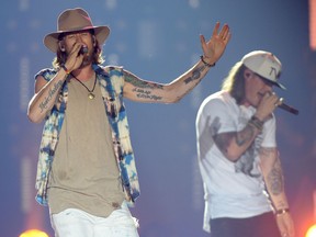 Brian Kelley, left, and Tyler Hubbard, right, perform during a Florida Georgia Line concert at the Brandt Centre in Regina, Sask. on Saturday Nov. 5, 2016.