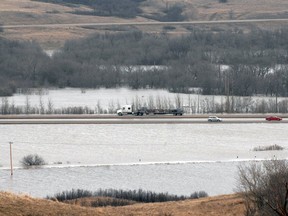 Water from the Qu'Appelle River encroaches on Highway 11 near Lumsden in 2011.