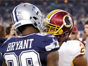 Dallas Cowboys wide receiver Dez Bryant (88) and Washington Redskins cornerback Josh Norman (24) exchange Thanksgiving greetings after their NFL game Thursday.