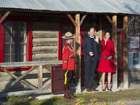 Prince William and his wife Kate, the Duke and Duchess of Cambridge, wave after touring the MacBride Museum of Yukon History in Whitehorse, Yukon, on Sept. 28.