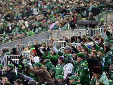 Fans cheer at the TV cameras during the last CFL game at old Mosaic Stadium in Regina, Sask. on Saturday Oct. 29, 2016. MICHAEL BELL