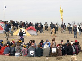 Water keepers sit in prayer at the site of the Dakota Access Pipeline protest.