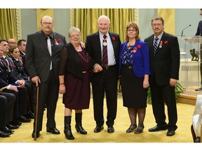 (l-r) Lorne and Dianne Matsalla are presented with a medal of bravery along with Geraldine and Phillip Shewchuk at Rideau Hall on Friday, Oct. 26. Credit: MCpl Vincent Carbonneau, Rideau Hall, OSGG
