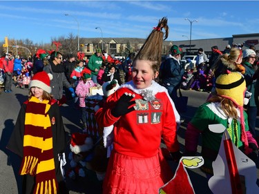 People fill the street at the Santa Claus Parade held on South Albert St. in Regina, Sask. on Sunday Nov. 20, 2016.