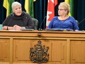 Tina Beaudry-Mellor, social services minister, left, and Deb Davies, Saskatchewan Foster Family Association, speak during an announcement at the Legislative Building offering Foster Family training online in Regina.