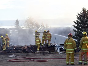 Regina Fire and Protective Services on the scene of a total loss house fire on Tower Road a little over a kilometre north of Highway 33.