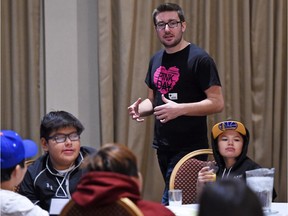 Pink Day co-founder Travis Price talking to students at a Red Cross Youth Symposium at the Ramada Plaza Hotel in Regina to train 100 students from across Saskatchewan to become youth facilitators to help prevent bullying. As youth facilitators, students will provide bullying prevention education to their peers and younger students in their schools and communities.