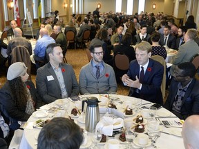 Dine and dash: 11 federal Conservative leadership candidates, including Chris Alexander (right), table hop at a "meet-the-candidate" luncheon sponsored by the Regina and District Chamber of Commerce.