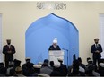 The world head of the Ahmadiyya Muslim Jama`at, the Caliph, Hazrat Mirza Masroor Ahmad leads prayers at the Mahmood Mosque.