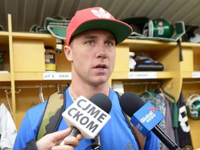 Saskatchewan Roughriders receiver Rob Bagg speaks with reporters in the CFL team's locker room on Sunday.