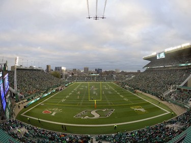 The Canadian Forces Snowbirds do a fly-over at the last CFL game at old Mosaic Stadium in Regina, Sask. on Saturday Oct. 29, 2016. MICHAEL BELL