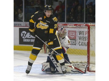 Brandon Wheat Kings forward Meyer Nell, 20, screens Regina Pats goalie Tyler Brown, 31, during a game at the Brandt Centre in Regina, Sask. on Tuesday Dec. 27, 2016.